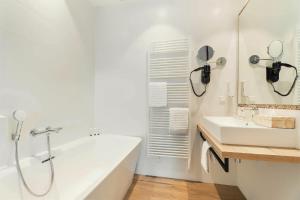Baðherbergi á Hotel Maassluis