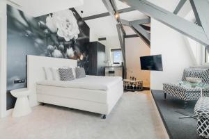 Sjónvarps- og/eða afþreyingartæki á Hotel Maassluis