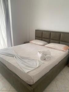 Postel nebo postele na pokoji v ubytování Hotel Dini