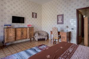 A bed or beds in a room at Casa Caterina