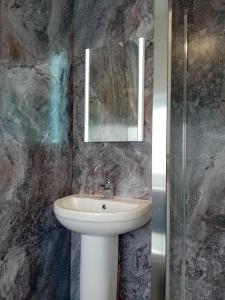 Um banheiro em Sea Air B&B