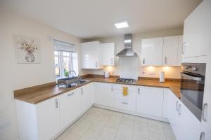 Køkken eller tekøkken på Contractor's Cove Leicester