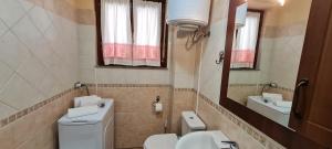 A bathroom at Gruppo Aedes Alghero, Residenza L'Isola - 200 mt dalla spiaggia