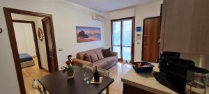 A seating area at Gruppo Aedes Alghero, Residenza L'Isola - 200 mt dalla spiaggia