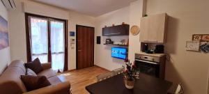 A kitchen or kitchenette at Gruppo Aedes Alghero, Residenza L'Isola - 200 mt dalla spiaggia