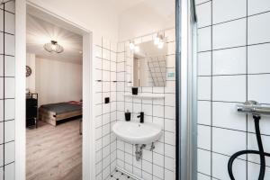 Koupelna v ubytování See Zeit + 19 fotografií