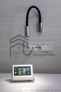 a phone is hooked up to a wall at Suites Marilia Apartments - Suite Livorno Holiday Home Group in Livorno