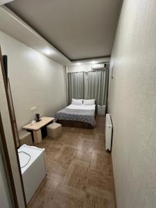Postel nebo postele na pokoji v ubytování Hotel G&G