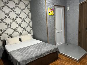 Postel nebo postele na pokoji v ubytování Hotel G&G