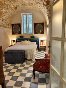 A bed or beds in a room at Salento magic