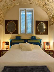 A bed or beds in a room at Salento magic