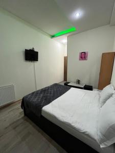 Postel nebo postele na pokoji v ubytování Hotel G&G