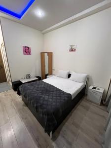 Postel nebo postele na pokoji v ubytování Hotel G&G