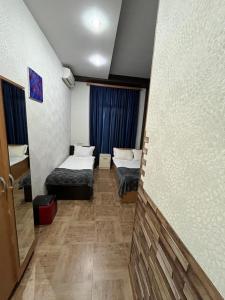 Postel nebo postele na pokoji v ubytování Hotel G&G
