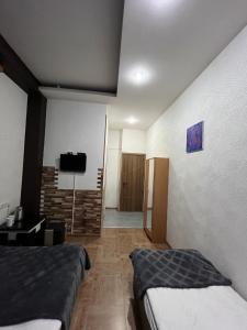 Postel nebo postele na pokoji v ubytování Hotel G&G