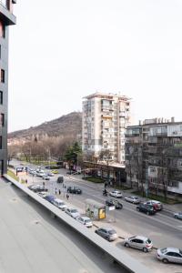 a busy city street with cars on a highway at Apartment KALINA with free private parking in Plovdiv
