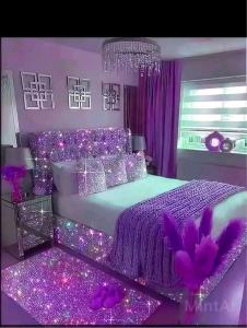a purple bedroom with a bed with purple lights at Welkom ketama bro in Ketama