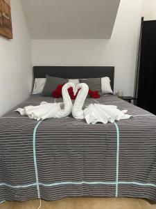 Postel nebo postele na pokoji v ubytování ALOJAMIENTO LOS DINOSAURIOS