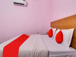 מיטה או מיטות בחדר ב-Hotel Yug Residency