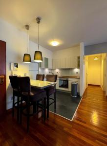 NOVO Central Apartments tesisinde mutfak veya mini mutfak