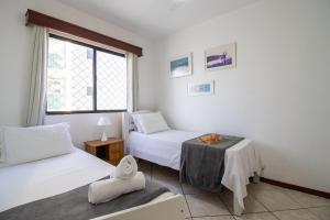 Katil atau katil-katil dalam bilik di DTO153 - Quadra do mar, Churrasqueira, 15o Andar