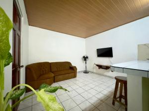 TV a/nebo společenská místnost v ubytování Casa Quepos