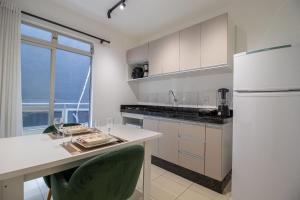 Kuchyň nebo kuchyňský kout v ubytování JOA34 - Sacada, 1 Suíte, Garagem, Climatizado