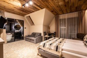 Posteľ alebo postele v izbe v ubytovaní ApartSki 18d