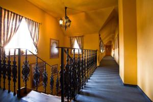 Voodi või voodid majutusasutuse Hotel U Simla toas