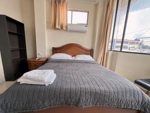 Voodi või voodid majutusasutuse Hostal Posada Del Sol toas