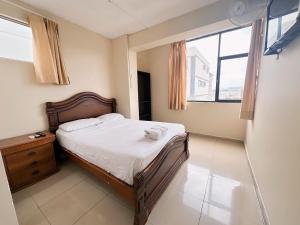 Voodi või voodid majutusasutuse Hostal Posada Del Sol toas