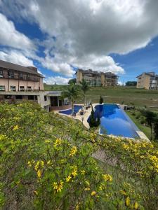 Πισίνα στο ή κοντά στο Condomínio Sonhos Da Serra