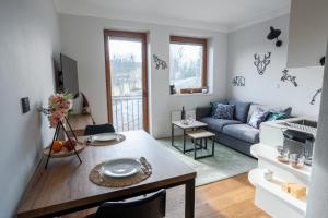 Posezení v ubytování Rodinný apartmán v srdci Krkonoš