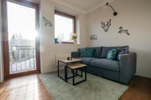 Posezení v ubytování Rodinný apartmán v srdci Krkonoš