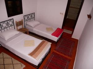 Un ou plusieurs lits dans un hébergement de l'établissement House of dreams in bin el ouidane