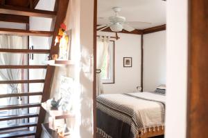 Säng eller sängar i ett rum på Casa Calamar
