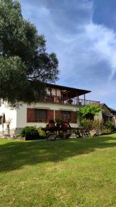 a house with bikes parked in front of it at Apartamentos Rurales Casa el Abad in San Pelayo de Tehona