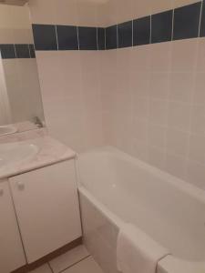 Ένα μπάνιο στο Appartement cosy