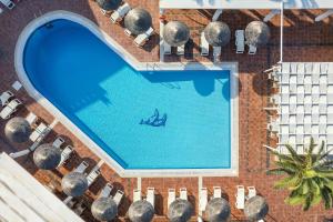 Bazén v ubytování Kavuras Village Hotel & Suites nebo v jeho okolí + 37 fotografií