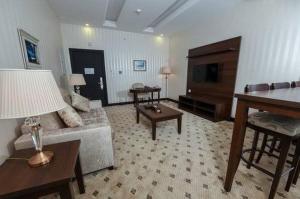 TV a/nebo společenská místnost v ubytování Verta Hotel Qouraish
