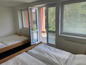 Postel nebo postele na pokoji v ubytování Apartman A1 Golem