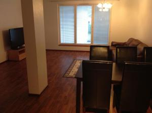 TV a/nebo společenská místnost v ubytování Cottage Tarha 1