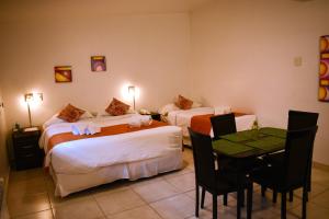 Cama ou camas em um quarto em Umbral del Aconcagua