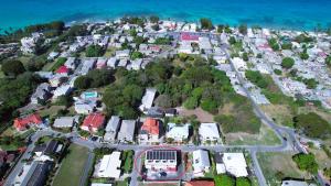 an aerial view of a town on a hill next to the ocean at Apartment 6, Kenridge Residences, West coast in Saint James