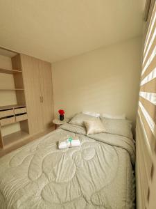 Кровать или кровати в номере Apartamento de lujo en Cúcuta.