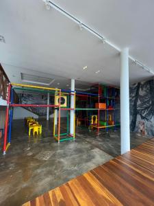 a room with a play room with a playground at Condomínio Sonhos Da Serra in Bananeiras +1 photo
