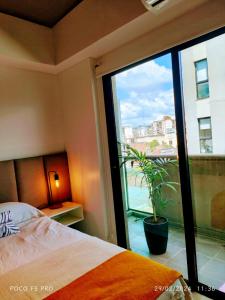 Postel nebo postele na pokoji v ubytování TERRA-BARRIO NORTE + 8 fotografií