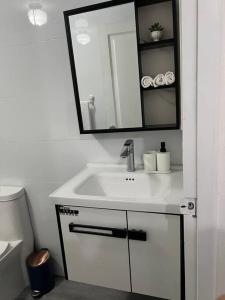 Koupelna v ubytování Moderno Apt en la ciudad