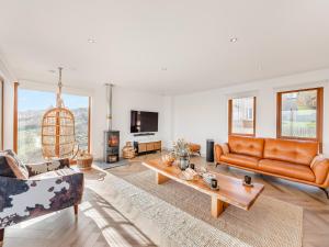 a living room with two couches and a coffee table at The Beaches in Berwick-Upon-Tweed