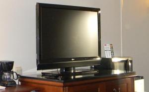TV a/nebo společenská místnost v ubytování Downtown Inn